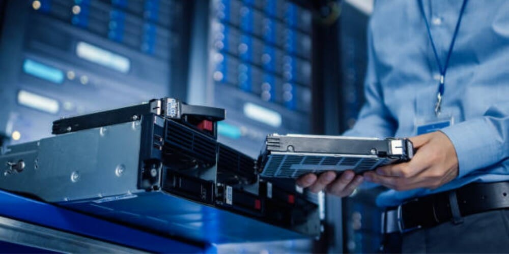 a professional man holding an HDD