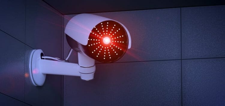 a red blinking light coming from a security camera a red blinking light coming from a security camera
