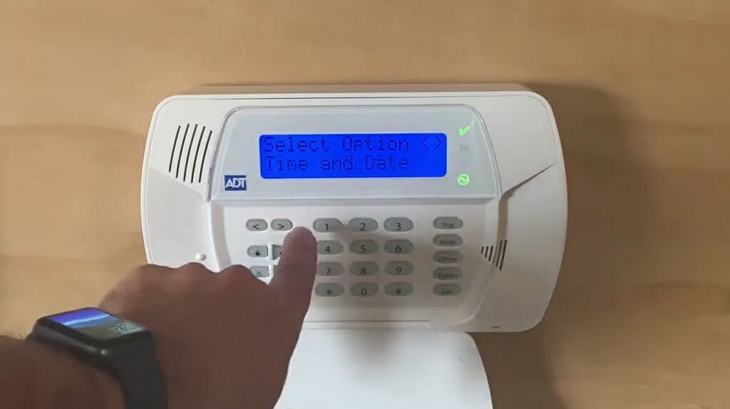 man selecting options for ADT's time and date