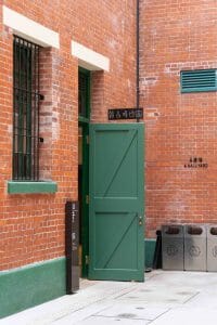 an open green door