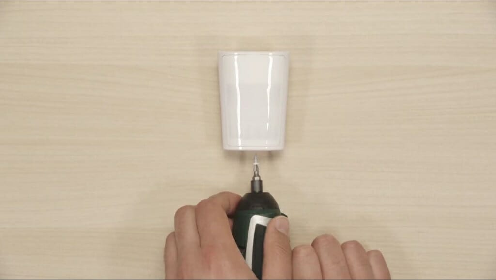 screwing the sensor to open