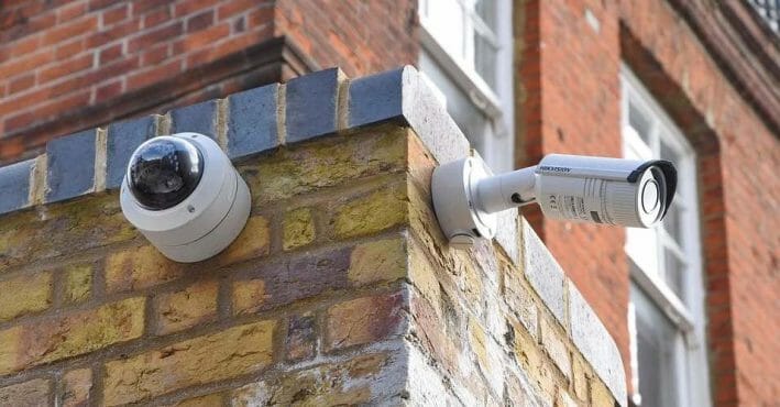 security cameras mounted at outside wall