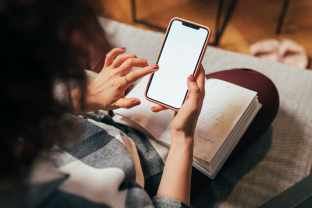 woman using her smartphone
